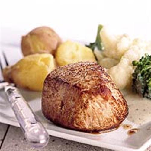 Gebakken kalfsoester met aardappels en groente